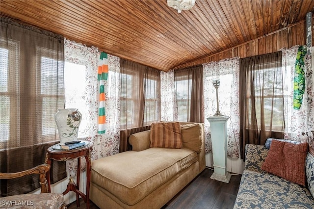 sunroom featuring plenty of natural light and wood ceiling