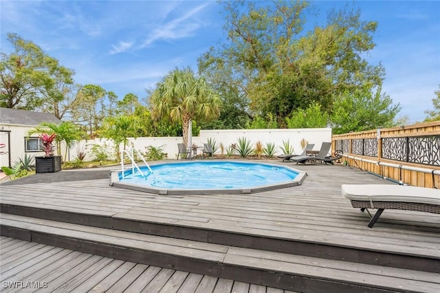 view of pool featuring a deck