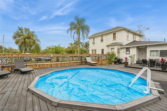 view of pool with a deck