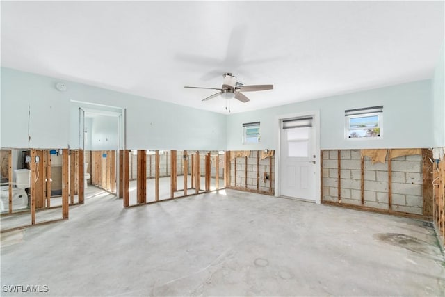 unfurnished room with ceiling fan