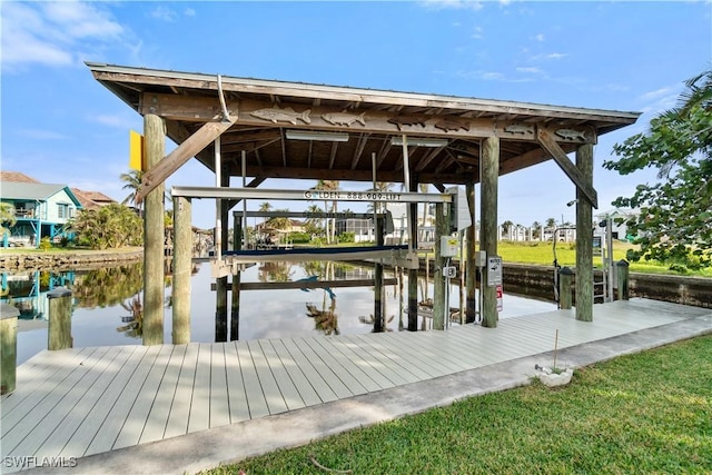 dock area with a water view