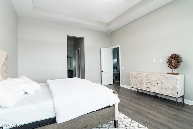 bedroom featuring dark hardwood / wood-style floors