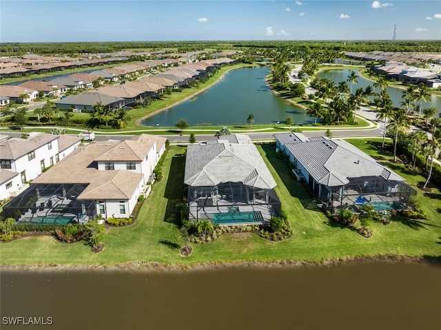 drone / aerial view with a water view