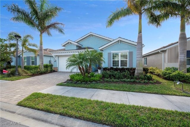 view of front of home featuring a garage