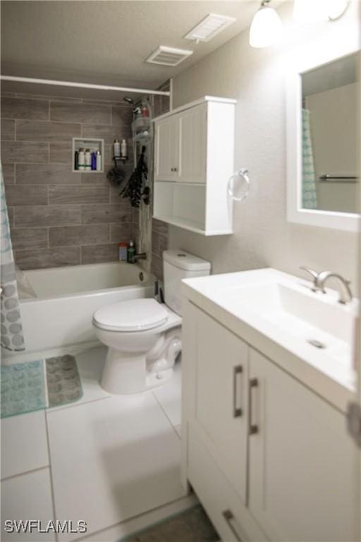 full bathroom with tile patterned floors, shower / bath combination with curtain, toilet, and vanity