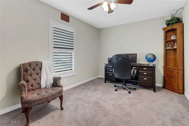 office featuring light colored carpet and ceiling fan