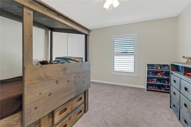 bedroom featuring ceiling fan and light colored carpet