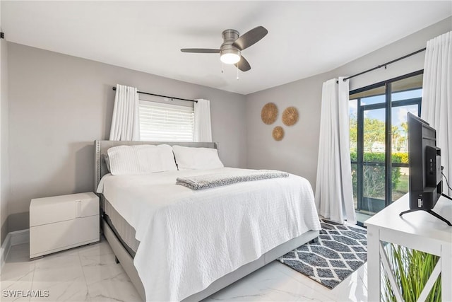 bedroom with access to outside, multiple windows, and ceiling fan