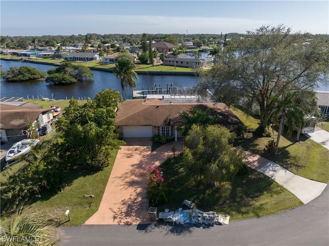 bird's eye view with a water view