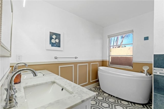 bathroom featuring vanity and a bathing tub