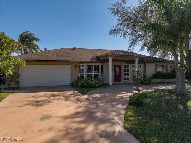 ranch-style home featuring a garage