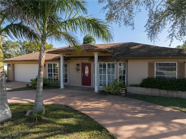 ranch-style home with a garage