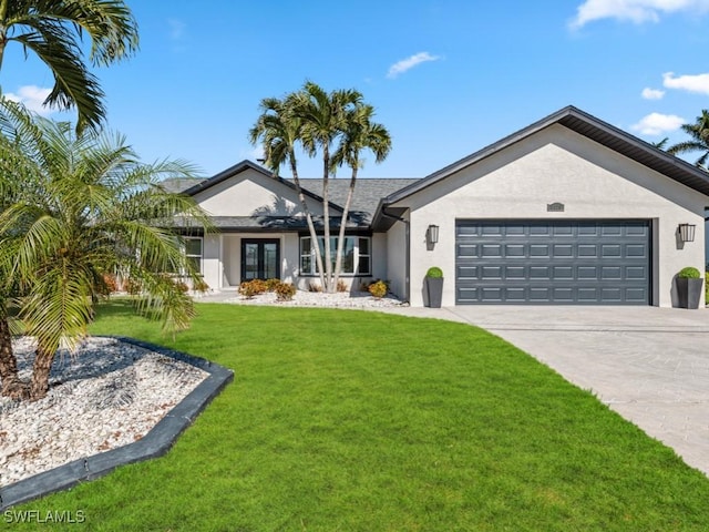 view of front facade featuring french doors, a garage, and a front lawn