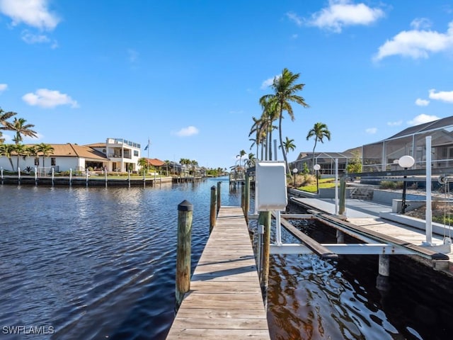 dock area with a water view