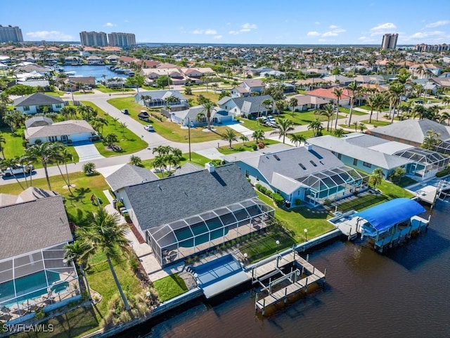 drone / aerial view with a water view