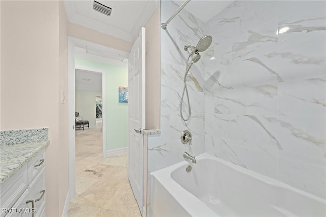 bathroom with washtub / shower combination, visible vents, vanity, and baseboards