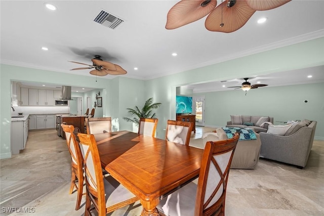 dining room featuring ceiling fan, recessed lighting, visible vents, and crown molding