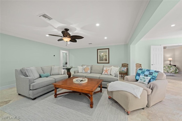 living room featuring crown molding and ceiling fan