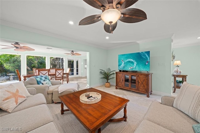 living room featuring ornamental molding, recessed lighting, and baseboards