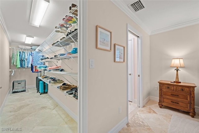 walk in closet with visible vents