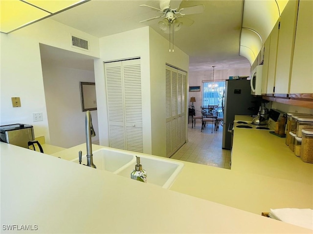 bathroom with ceiling fan