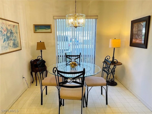 dining room with a chandelier