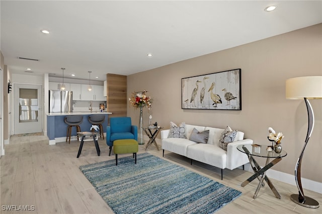 living room featuring light wood-type flooring