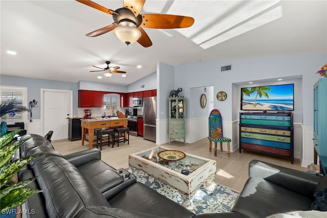 living room with lofted ceiling