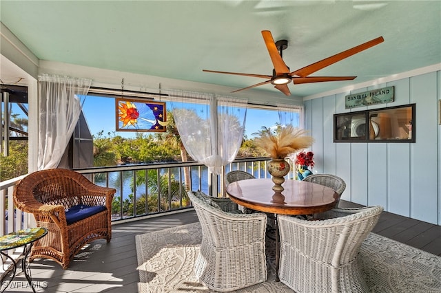 sunroom / solarium with ceiling fan