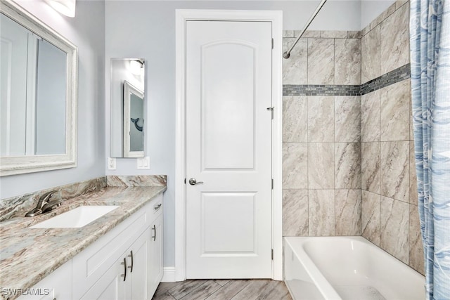 bathroom with vanity and shower / tub combo with curtain