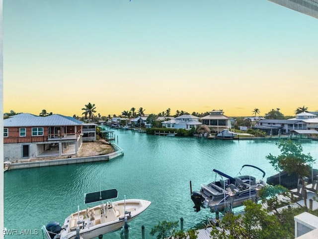 view of water feature with a dock