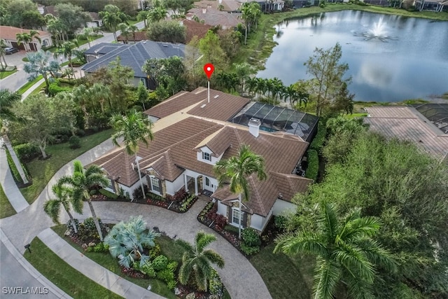 birds eye view of property featuring a water view