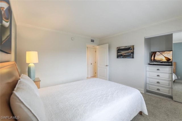 bedroom with carpet and ornamental molding