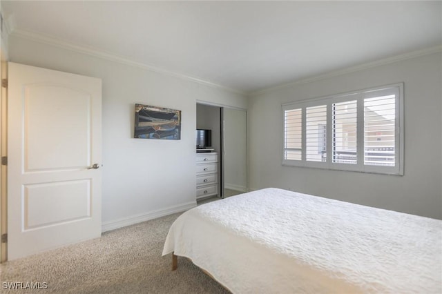 carpeted bedroom featuring ornamental molding