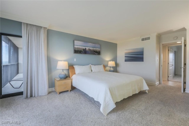 carpeted bedroom with ornamental molding