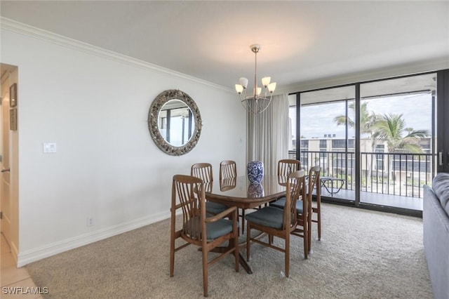 dining space with light carpet, an inviting chandelier, and crown molding