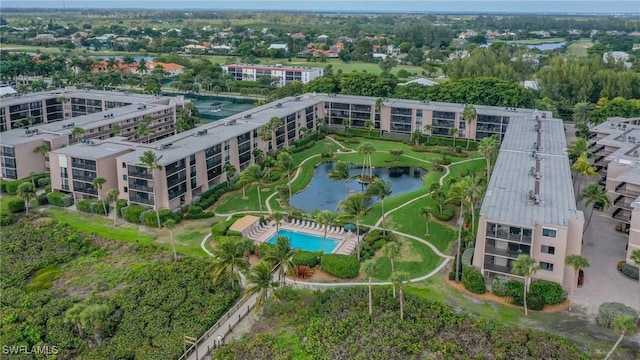 bird's eye view with a water view