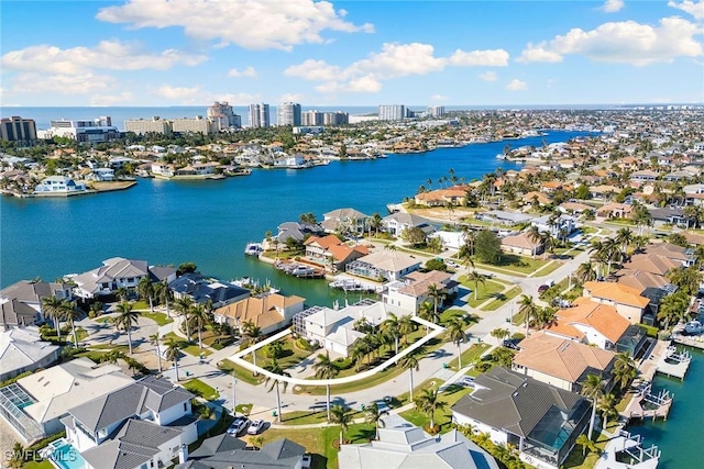 drone / aerial view with a water view