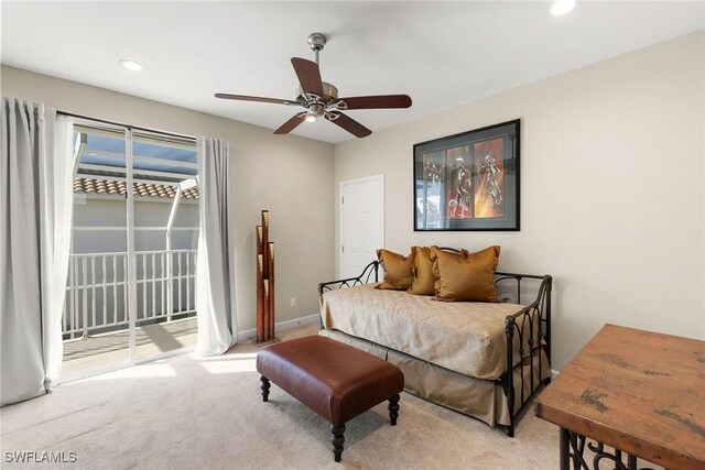 carpeted bedroom with ceiling fan and access to outside