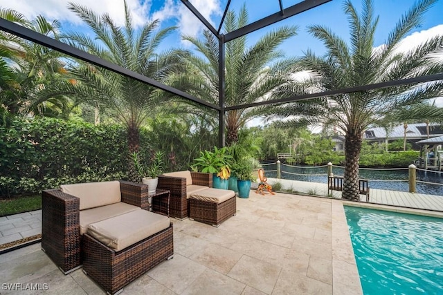 view of patio / terrace featuring glass enclosure