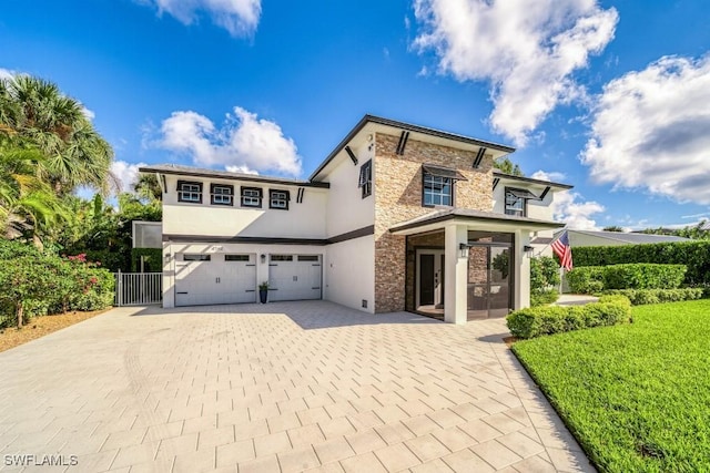 view of front of home featuring a garage