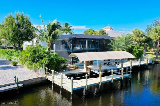 dock area featuring a water view and a lanai