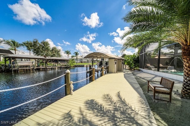 view of dock with a lanai, a water view, and a pool