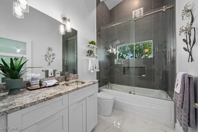 full bathroom with vanity, bath / shower combo with glass door, lofted ceiling, and toilet