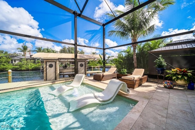 view of pool featuring a lanai and a water slide