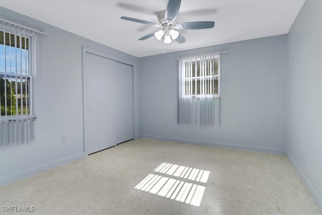 empty room featuring ceiling fan