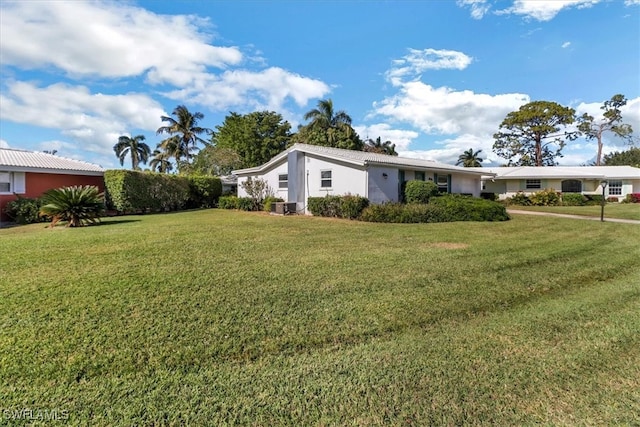 exterior space featuring a yard