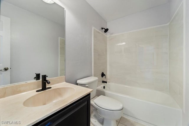 full bathroom with tile patterned floors, tiled shower / bath combo, toilet, and vanity