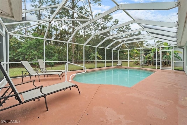 view of pool featuring a lanai and a patio area