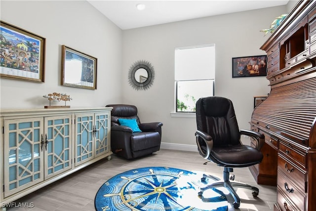 home office featuring light hardwood / wood-style flooring